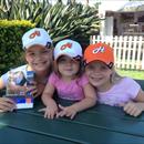 Lili, Sophia and Georja Francis sporting their Hawkes Racing caps at the 2013 Magic Millions QTIS sale...